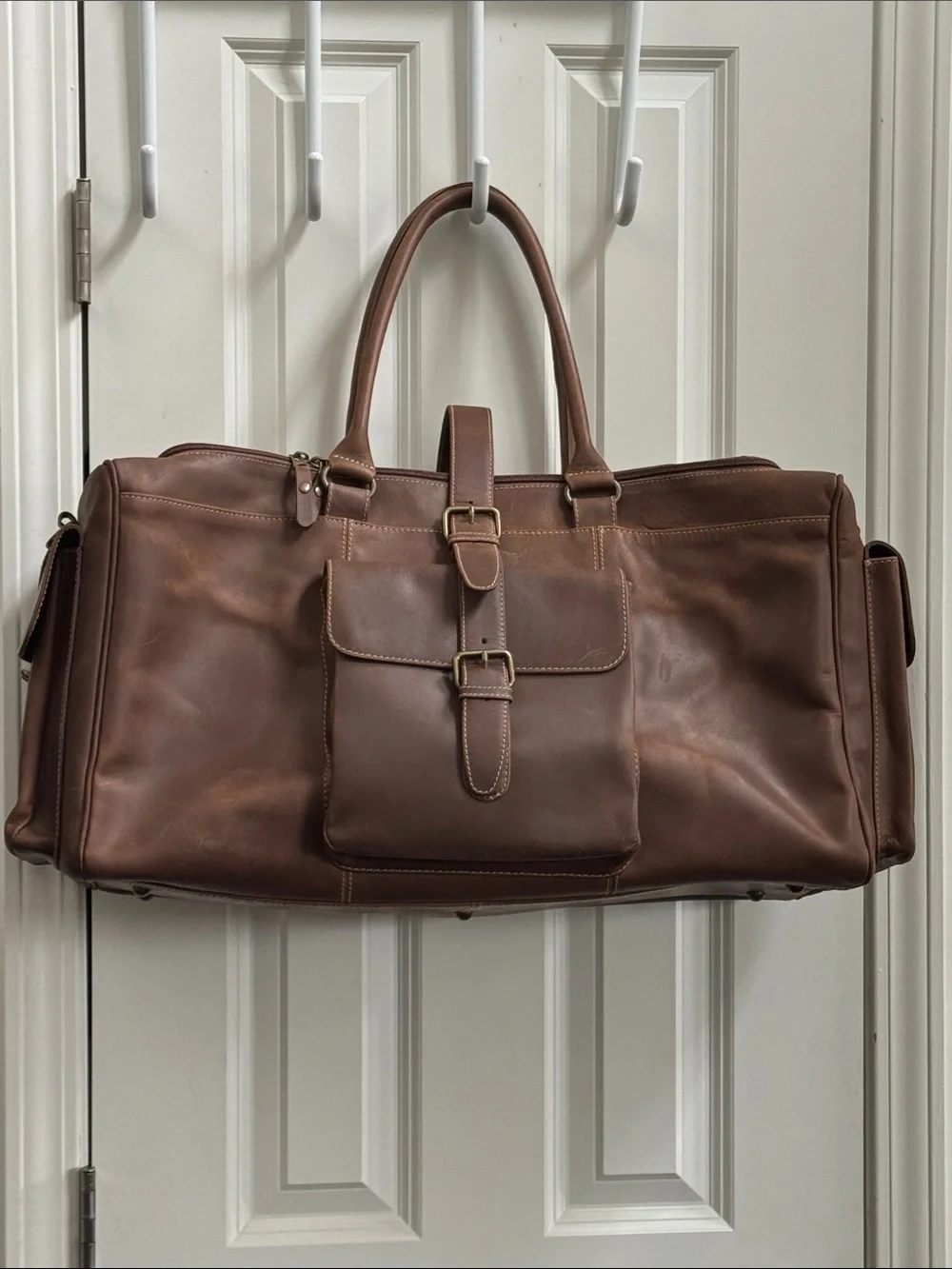 Classic Brown Distressed Leather Duffel Bag with Front Buckle Pocket, no strap
